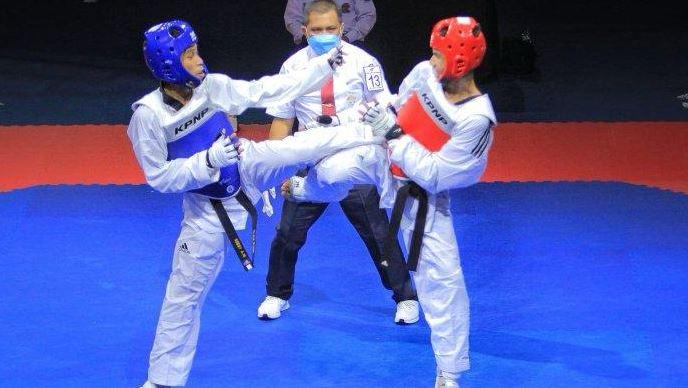 Ilustrasi Atlet Taekwondo Sedang Bertanding. (Ist)